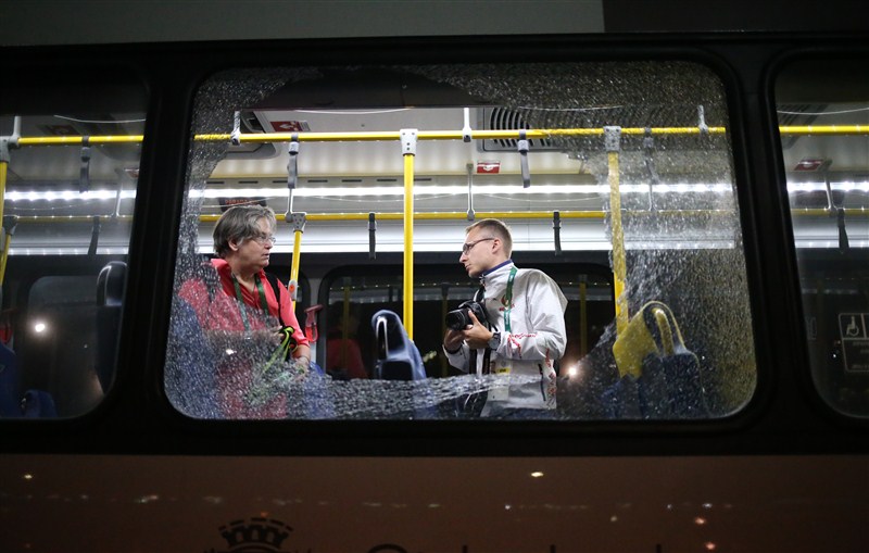 An Olympic media shuttle bus was attacked on the way back to Barra Olympic park here on Tuesday as one of its windows was broken. Olympic media bus attacked,Olympic bus attacked,Barra Olympic park,Rio,Rio Olympic attack,Rio Olympic 2016,Olympic media
