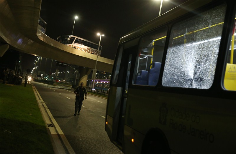 An Olympic media shuttle bus was attacked on the way back to Barra Olympic park here on Tuesday as one of its windows was broken. Olympic media bus attacked,Olympic bus attacked,Barra Olympic park,Rio,Rio Olympic attack,Rio Olympic 2016,Olympic media