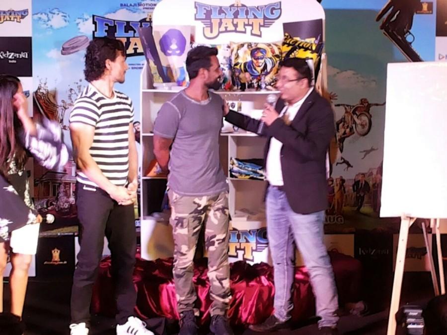 Actor Tiger Shroff and director-choreographer Remo D'souza on Friday launched a game based on their forthcoming film Tiger Shroff,Remo D'souza,A Flying Jatt,A Flying Jatt game,A Flying Jatt game launch,director-choreographer Remo D'souza,bollywood movie A Flying Jatt,A Flying Jatt promotions,A Flying Jatt movie promotions