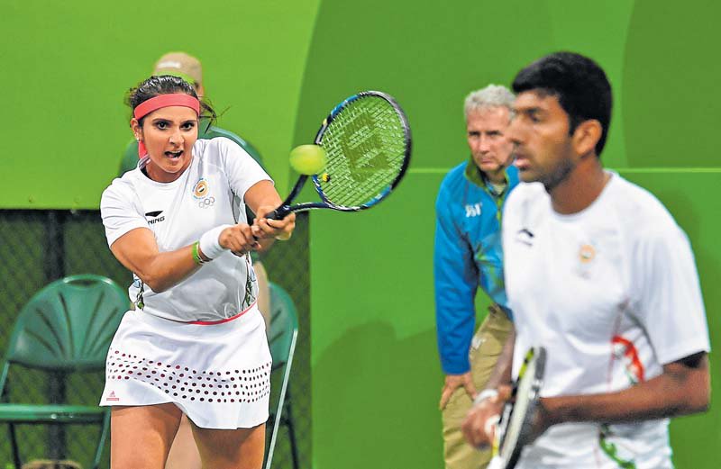The star Indian duo of Sania Mirza and Rohan Bopanna entered the semi-finals of the mixed doubles tennis event at the ongoing Rio Olympics by defeating Andy Murray and Heather Watson of Britain in straight sets here. Sania Mirza,Rohan Bopanna,Sania Mirza and Rohan Bopanna,Sania Mirza-Rohan Bopanna,Andy Murray,Rio Olympics,Rio Olympics 2016,mixed doubles semi-finals