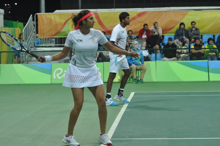 The star Indian duo of Sania Mirza and Rohan Bopanna entered the semi-finals of the mixed doubles tennis event at the ongoing Rio Olympics by defeating Andy Murray and Heather Watson of Britain in straight sets here. Sania Mirza,Rohan Bopanna,Sania Mirza and Rohan Bopanna,Sania Mirza-Rohan Bopanna,Andy Murray,Rio Olympics,Rio Olympics 2016,mixed doubles semi-finals