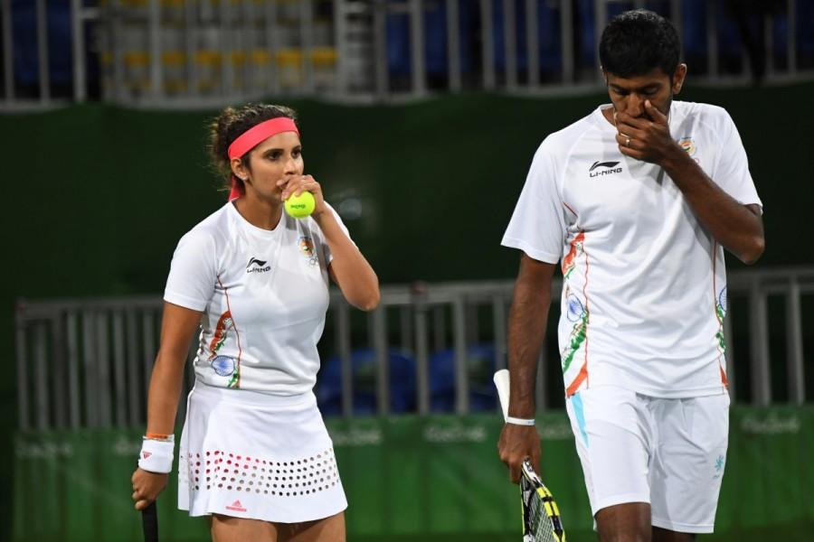 The Indian duo of Sania Mirza and Rohan Bopanna went down fighting in the semi-finals of the mixed doubles tennis event to the US team of Venus Williams and Rajeev Ram at the Rio Olympics here. Sania-Bopanna,Sania Mirza,Rohan Bopanna,mixed doubles semi,Venus Williams,Rajeev Ram,Rio Olympics,Rio Olympics 2016,Rio Olympics pics,Rio Olympics images,Rio Olympics photos,Rio Olympics stills,Rio Olympics pictures