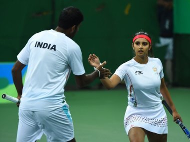 The Indian duo of Sania Mirza and Rohan Bopanna went down fighting in the semi-finals of the mixed doubles tennis event to the US team of Venus Williams and Rajeev Ram at the Rio Olympics here. Sania-Bopanna,Sania Mirza,Rohan Bopanna,mixed doubles semi,Venus Williams,Rajeev Ram,Rio Olympics,Rio Olympics 2016,Rio Olympics pics,Rio Olympics images,Rio Olympics photos,Rio Olympics stills,Rio Olympics pictures
