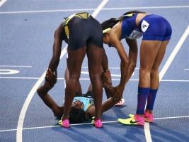 Shaunae Miller,Shaunae Miller dives for 400m gold,Shaunae Miller 400m gold,Shaunae Miller gets gold,Olympic 400 meters gold medal,gold medal,Rio Olympics 2016,Rio Olympics winner