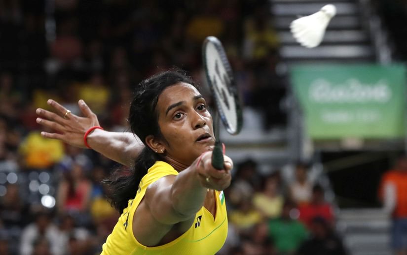 Indian shuttler P.V. Sindhu caused a huge upset, stunning World No.2 Wang Yihan of China in straight games to enter the semi-finals of the women's singles category at the ongoing Rio Olympics. Rio Olympics 2016,Shuttler Sindhu enters Olympic semis,Sindhu enters semis,P.V. Sindhu,Wang Yihan,Sindhu beats Wang Yihan,Rio Olympics,Rio Olympics pics,Rio Olympics images,Rio Olympics photos