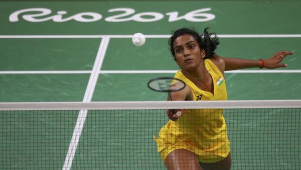 Indian shuttler P.V. Sindhu caused a huge upset, stunning World No.2 Wang Yihan of China in straight games to enter the semi-finals of the women's singles category at the ongoing Rio Olympics. Rio Olympics 2016,Shuttler Sindhu enters Olympic semis,Sindhu enters semis,P.V. Sindhu,Wang Yihan,Sindhu beats Wang Yihan,Rio Olympics,Rio Olympics pics,Rio Olympics images,Rio Olympics photos