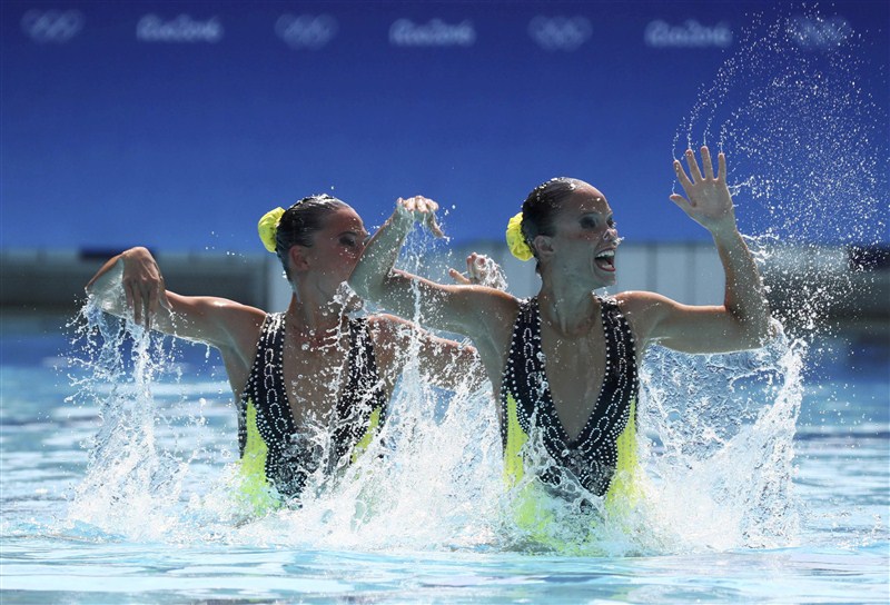 Synchronized swimmers reveal complex coordination under the water's surface at the Rio Olympics. Dancing beneath the water,swimmers,water surface,Under Water Dancing,Rio Olympics 2016,Rio Olympics,Rio Olympics pics,Rio Olympics images,Rio Olympics photos,Rio Olympics stills,Rio Olympics pictures
