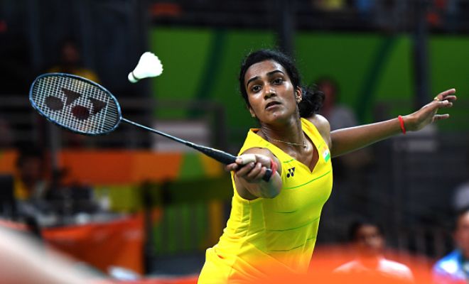 India's P.V. Sindhu thumped Nozomi Okuhara of Japan to enter the final of the women's singles event of badminton competitions, assuring the country at least a silver medal at the Olympic Games here on Thursday. PV Sindhu,PV Sindhu in Final,PV Sindhu in badminton final,badminton final,Nozomi Okuhara,badminton competitions,PV Sindhu pics,PV Sindhu images,PV Sindhu photos,PV Sindhu stills,PV Sindhu pictures