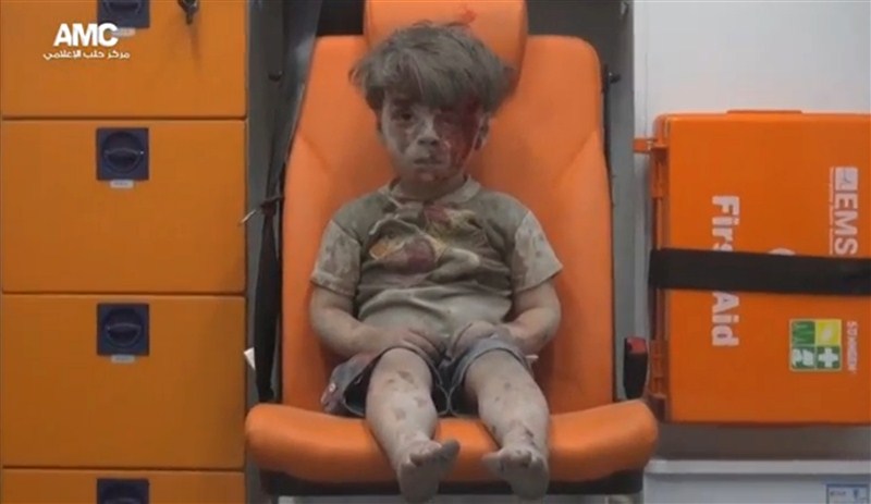 Children in Syria face shelling, air strikes, barrel bombs and militant attacks as the civil war that has decimated the nation continues to rage. Syria's children caught civil war,civil war,Syria's children,Syria children,barrel bombs,Syria face shelling,air strikes