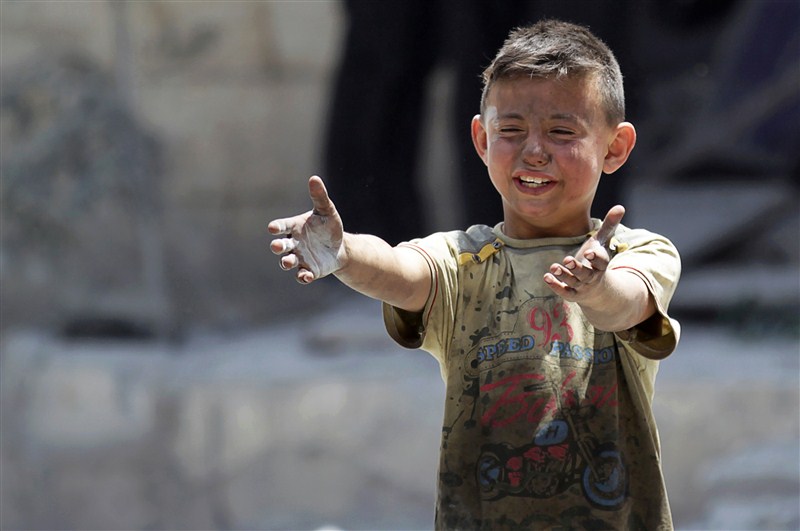 Children in Syria face shelling, air strikes, barrel bombs and militant attacks as the civil war that has decimated the nation continues to rage. Syria's children caught civil war,civil war,Syria's children,Syria children,barrel bombs,Syria face shelling,air strikes