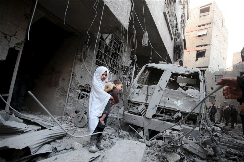 Children in Syria face shelling, air strikes, barrel bombs and militant attacks as the civil war that has decimated the nation continues to rage. Syria's children caught civil war,civil war,Syria's children,Syria children,barrel bombs,Syria face shelling,air strikes