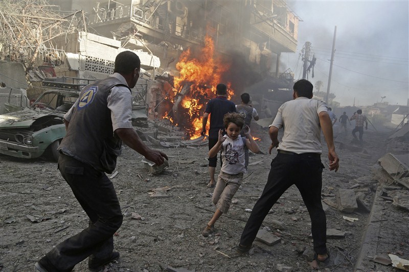 Children in Syria face shelling, air strikes, barrel bombs and militant attacks as the civil war that has decimated the nation continues to rage. Syria's children caught civil war,civil war,Syria's children,Syria children,barrel bombs,Syria face shelling,air strikes