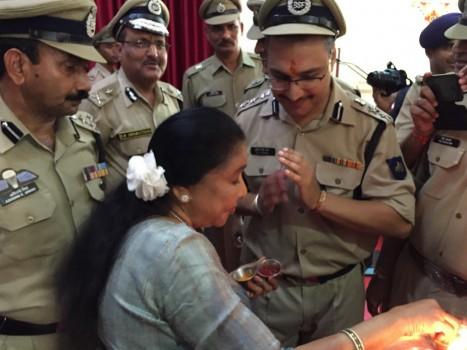 Legendary singer Asha Bhosle dedicated Raksha Bandhan to the Indian armed forces by tying rakhis to Border Security Force (BSF) personnel here.