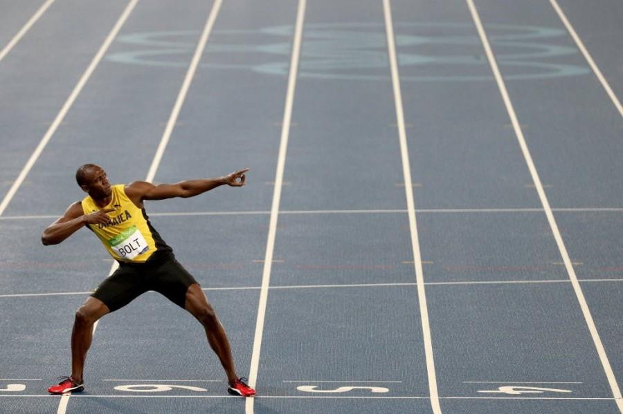 Usain Bolt won the men's 200 metres title at a third consecutive Olympics with a dominant performance and moved another step closer to his target of clinching three gold medals at the Rio Games here. Usain Bolt,Usain Bolt wins 200m title,Rio Olympics,Usain Bolt third consecutive Olympics title,Usain Bolt winner,Usain Bolt pics,Usain Bolt images,Usain Bolt photos,Usain Bolt stills