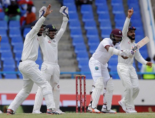 Rain played spoilsport in the first session of the opening day of the fourth and final Test between India and the West Indies, as the hosts reached 62/2 before the interruption at the Queen's Park Oval here on Thursday. India,India vs West Indies,West Indies,India vs West Indies Test Series,india vs west indies 2016,Rain halts first session