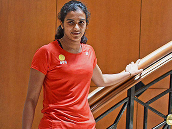 Star shuttler P.V. Sindhu entered the women's singles final to assure India of a second medal at the Rio Olympics while the Indian contingent suffered a blow with wrestler Narsingh Yadav being banned for four years over a doping offence. PV Sindhu,PV Sindhu rare pics,PV Sindhu pics,PV Sindhu vs Carolina Marin,PV Sindhu images,PV Sindhu stills,PV Sindhu photos,PV Sindhu unseen images,PV Sindhu rare photos,PV Sindhu rare pictures