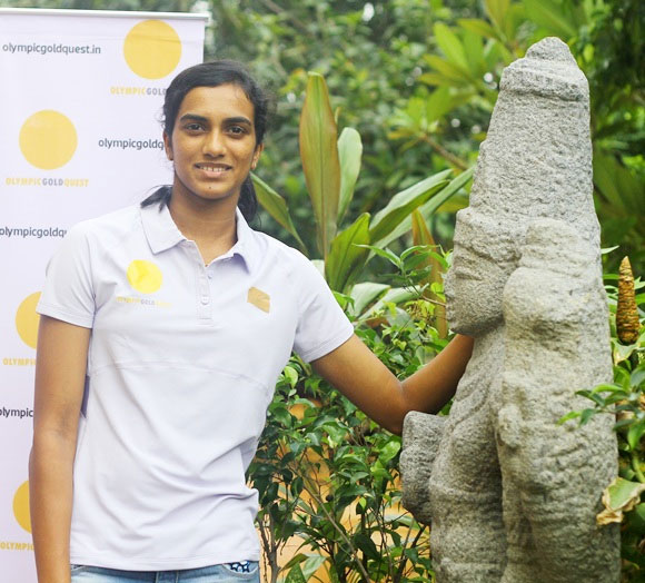 Star shuttler P.V. Sindhu entered the women's singles final to assure India of a second medal at the Rio Olympics while the Indian contingent suffered a blow with wrestler Narsingh Yadav being banned for four years over a doping offence. PV Sindhu,PV Sindhu rare pics,PV Sindhu pics,PV Sindhu vs Carolina Marin,PV Sindhu images,PV Sindhu stills,PV Sindhu photos,PV Sindhu unseen images,PV Sindhu rare photos,PV Sindhu rare pictures