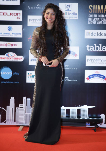 South Indian International Movie Awards (2016) event held at Suntec Convention and Exhibition Centre in Singapore. Celebs like Nayantara, Allu Arjun, Anirudh Ravichander, Arun Vijay with his family, Haniska Motwani, Keerthy Suresh, Prakash Raj, Raai Laxmi, Radhika Sarath Kumar, Sai Pallavi, Nithya Menen, Amyra Dastur, Shriya Saran, Khushboo, Vikram, Sivakarthikeyan, Jayam Ravi with his wife, Radhika Apte, Rana Daggubati, Chiranjeevi, Allu Arvind, Shruti Haasan, Suhasini Maniratnam, Samantha Ruth Prabhu, Pranitha Subhash, Puneeth Rajkumar, Sai Kumar, Ali with his wife, Sudheer Babu, Usha Utappa, Lakshmi Manchu, Pragya, Devi Sri Prasad, Anirudh Ravichander, Urvashi Rautela, Vignesh Shivan, S. Janaki, Tejaswini Prakash, Sonal Chauhan, Vedhika, Saqib Saleem, comedy actor Satish, Huma Qureshi and others graced the event. SIIMA Awards 2016,SIIMA Awards,Nayantara,Shruthi Hassan,Samantha,Sai Pallavi,SIIMA Awards pics,SIIMA Awards images,SIIMA Awards photos,SIIMA Awards stills,SIIMA Awards pictures