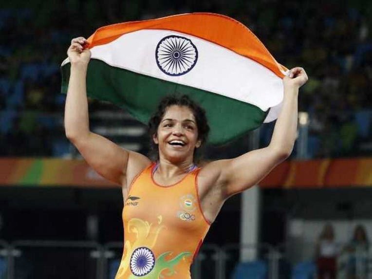 Wrestler Sakshi Malik, who opened India's account at the Rio Olympics with a bronze medal in the women's 58 kilogram freestyle category, will be carrying the flag at the closing ceremony on Sunday. Rio Olympics 2016,Wrestler Sakshi Malik,Sakshi Malik,Sakshi Malik at closing ceremony,closing ceremony,Rio closing ceremony,Rio 2016 closing ceremony,Sakshi to carry tricolour,Olympics closing ceremony,Olympics closing ceremony pics,Olympics closing cere