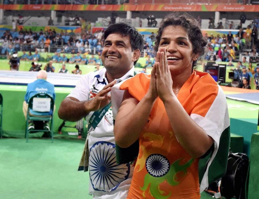 Wrestler Sakshi Malik, who opened India's account at the Rio Olympics with a bronze medal in the women's 58 kilogram freestyle category, will be carrying the flag at the closing ceremony on Sunday. Rio Olympics 2016,Wrestler Sakshi Malik,Sakshi Malik,Sakshi Malik at closing ceremony,closing ceremony,Rio closing ceremony,Rio 2016 closing ceremony,Sakshi to carry tricolour,Olympics closing ceremony,Olympics closing ceremony pics,Olympics closing cere