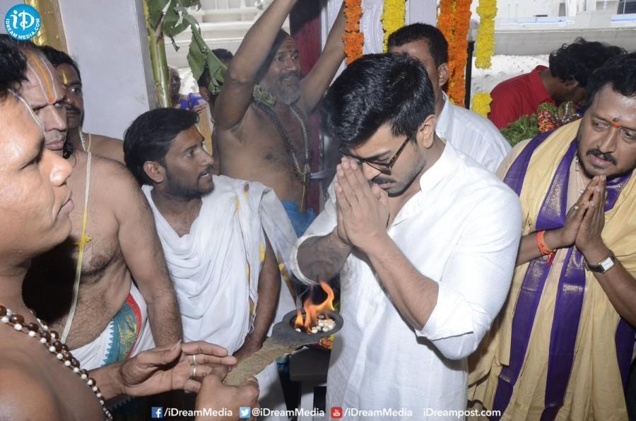Actor Ram Charan performs special pooja on the eve of Chiranjeevi's birthday. Ram Charan,Ram Charan Teja,Chiranjeevi,Chiranjeevi birthday,Ram Charan perform special pooja,Chiranjeevi birthday celebrations,Chiranjeevi birthday special,Chiru 150,Khaidi 150,Khaidi 150 first look,Khaidi 150 poster