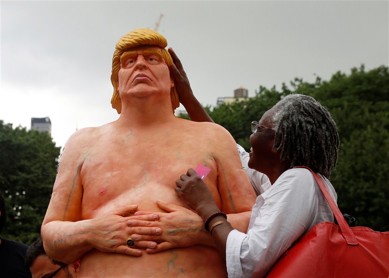 NYC parks workers remove a nude statue of Donald Trump from Union Square. Nude Donald Trump,Nude Donald Trump statue,Donald Trump Nude statue,Donald Trump Nude,Donald Trump statue removed,Nude statue,Union Square,NYC parks