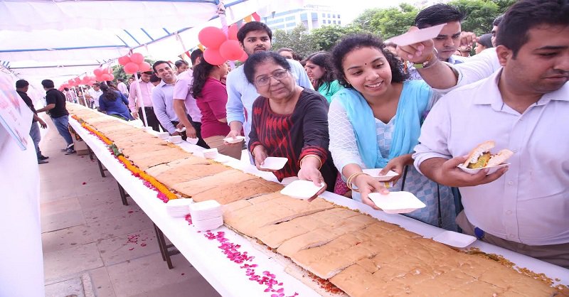 A team of 25 people used 200 kg of potatoes and bread each to make the world's longest Vada Pao in just three hours -- 145 feet long. So said a spokesperson for Nukkadwala, a chain of restaurants which brings street food from across India, on Tuesday, the World Vada Pao Day. Vada Pao,Longest Vada Pao,Worlds Longest Vada Pao,Big Vada Pao,Biggest Vada Pao,145 feet Vada Pao,World's longest Vada Pao