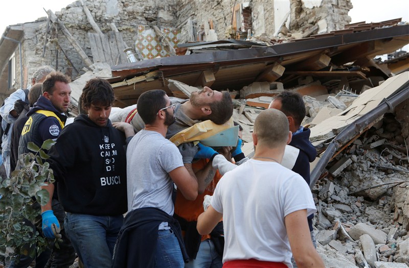 At least 13 people were killed as a magnitude 6.2 earthquake struck central Italy early on Wednesday, officials said. Many were trapped under rubble as buildings and houses collapsed due to the tremors that were also felt in the country's capital city of Rome, BBC reported. Some buildings shook for 20 seconds. Earthquake,Earthquake in Italy,Italy Earthquake,italy earthquake live,italy earthquake photos,Italy Earthquake pics,Italy Earthquake images,Italy Earthquake pictures,Italy Earthquake stills