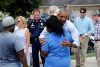President Barack Obama walked door to door in an East Baton Rouge Parish neighborhood hugging people and offering assurances that the country would help them recover from some of the worst floods ever recorded in Louisiana.