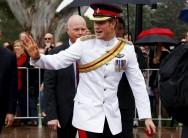 Britain's Prince Harry reacts after shaking hands with members of the public after visiting the Australian War Memorial in Canberra on 6 April 2015.
