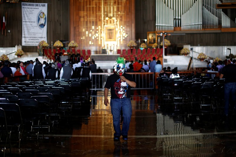 Masked lucha libre wrestlers take part in an annual pilgrimage to the Basilica of Our Lady Guadalupe in Mexico City. Mexican wrestlers,Masked lucha libre,Masked lucha libre wrestlers,wrestlers,Lady Guadalupe,Mexico City,Basilica