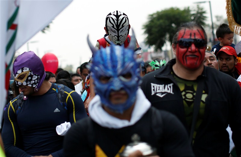 Masked lucha libre wrestlers take part in an annual pilgrimage to the Basilica of Our Lady Guadalupe in Mexico City. Mexican wrestlers,Masked lucha libre,Masked lucha libre wrestlers,wrestlers,Lady Guadalupe,Mexico City,Basilica