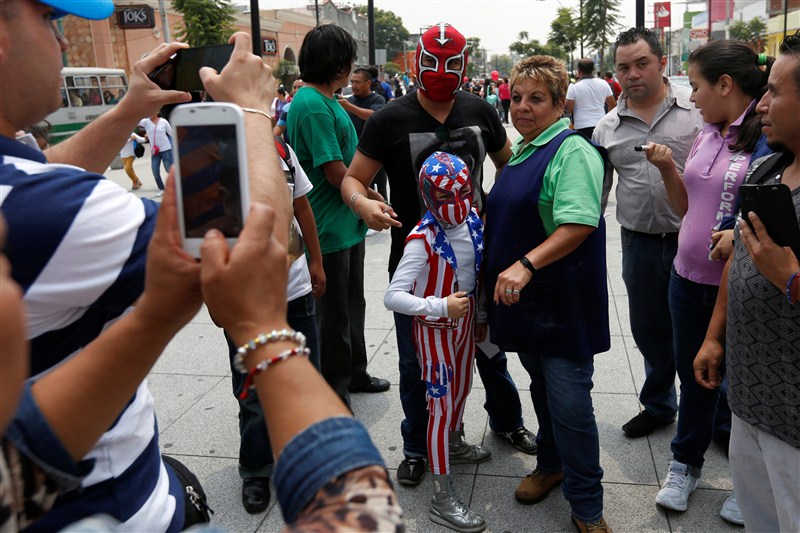 Masked lucha libre wrestlers take part in an annual pilgrimage to the Basilica of Our Lady Guadalupe in Mexico City. Mexican wrestlers,Masked lucha libre,Masked lucha libre wrestlers,wrestlers,Lady Guadalupe,Mexico City,Basilica