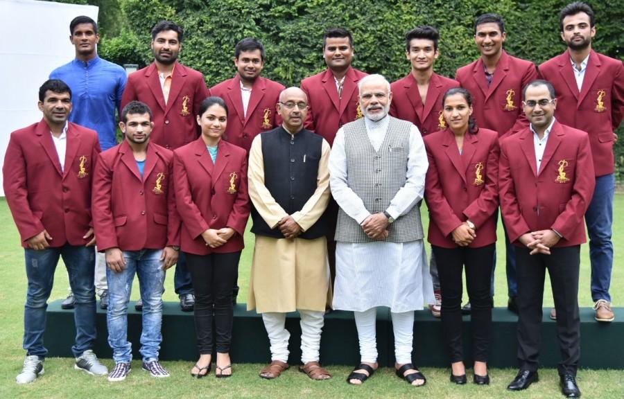 Prime Minister Narendra Modi met Rio Olympics silver medallist P.V. Sindhu and bronze medal winner Sakshi Malik at his residence here on Sunday. National Sports Day,National Sports Day 2016,PM Narendra Modi,Narendra Modi,Narendra Modi meets P.V. Sindhu,Sakshi Malik,Dipa Karmakar,Narendra Modi meets Sakshi Malik,Narendra Modi meets Dipa Karmakar