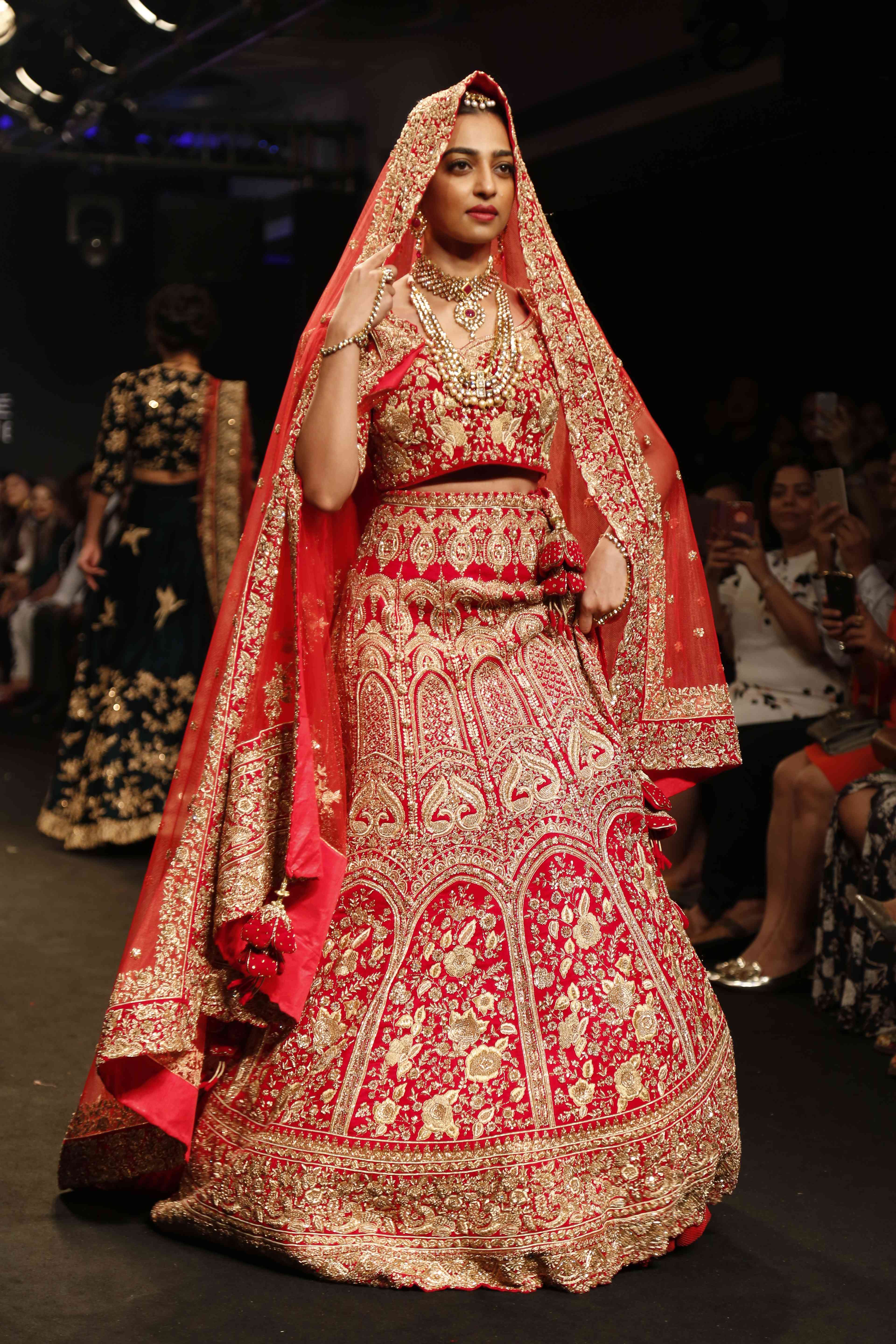 Sanskrit - Our Top Looks from FDCI x Lakme Fashion Week ! @janhvikapoor in  a timeless and stunning red lehenga by @punitbalanaofficial . For two  decades Sanskrit HongKong has been the house