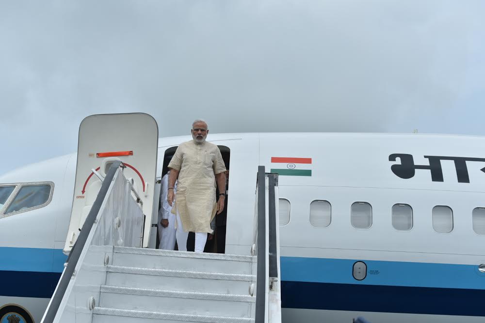 Prime Minister Narendra Modi on Tuesday visits his home state Gujarat to launch an irrigation scheme-- SAUNI Yojna, a project initiated by him in 2012 as Chief Minister. Prime Minister Narendra Modi,Narendra Modi,PM Narendra Modi,Narendra Modi reaches Gujarat,Narendra Modi in Gujarat,Narendra Modi launches irrigation scheme,irrigation scheme,Narendra Modi launches irrigation scheme in Gujarat