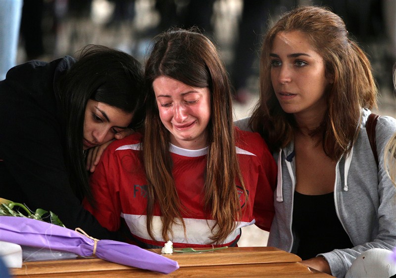 Friends and family grieve for their loved ones after a devastating earthquake struck central Italy. Italy,earthquake,funeral,amatrice,renzi,mattarella,State funeral in Italy honours quake victims,State funeral for quake victims,Italy honours quake victims,Italy quake victims