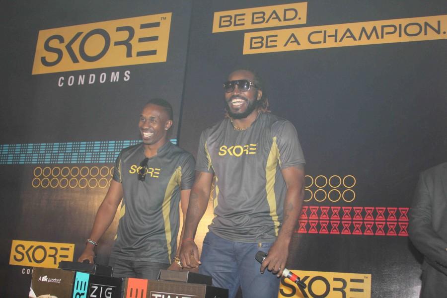 West Indies cricket players Chris Gayle and Dwayne Bravo launch Skore champion series condoms. Chris Gayle and Dwayne Bravo,Chris Gayle,Dwayne Bravo,Chris Gayle launches condoms,Dwayne Bravo launches condoms,condoms,Skore champion series condoms