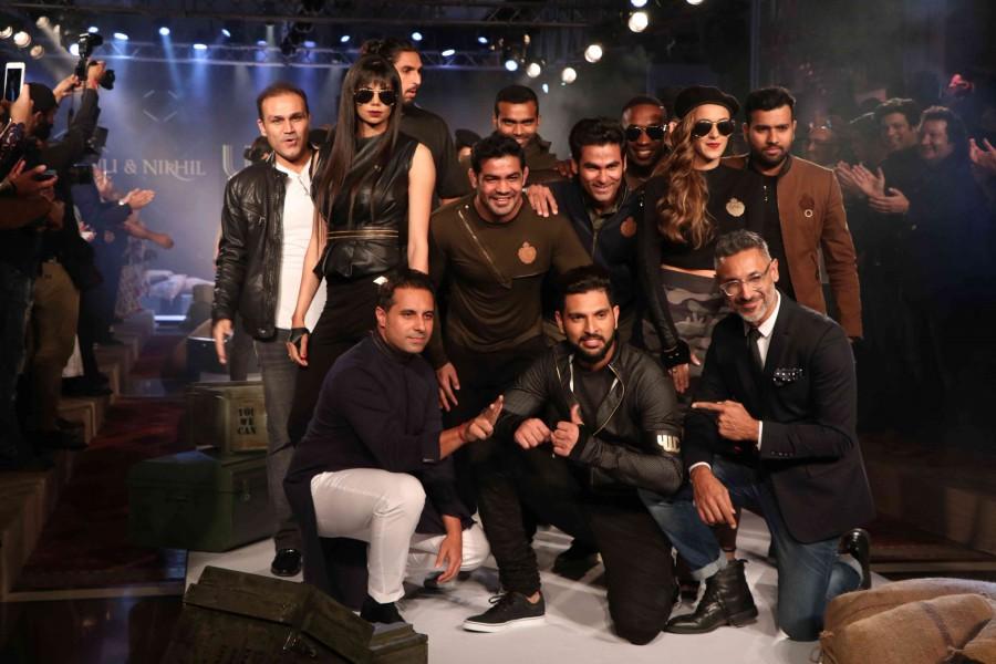Cricketer Yuvraj Singh has forayed into the fashion industry by launching his brand YWC Fashion in collaboration with designers Shantanu and Nikhil. Celebs like Virender Sehwag, Chris Gayle, Zaheer Khan, Ishant Sharma and others graced the event. Yuvraj Singh,Yuvraj Singh's clothline launch,Virender Sehwag,Chris Gayle,Zaheer Khan,Ishant Sharma,Yuvraj Singh clothline launch,Yuvraj Singh clothline launch pics,Yuvraj Singh clothline launch images,Yuvraj Singh clothline launch photos,Yuvraj Singh