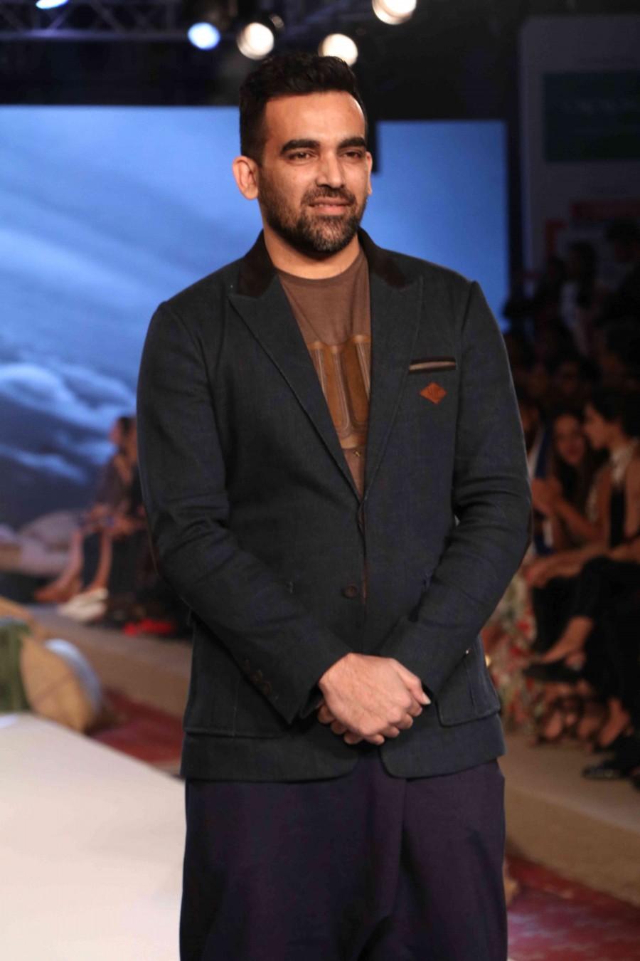 Cricketer Yuvraj Singh has forayed into the fashion industry by launching his brand YWC Fashion in collaboration with designers Shantanu and Nikhil. Celebs like Virender Sehwag, Chris Gayle, Zaheer Khan, Ishant Sharma and others graced the event. Yuvraj Singh,Yuvraj Singh's clothline launch,Virender Sehwag,Chris Gayle,Zaheer Khan,Ishant Sharma,Yuvraj Singh clothline launch,Yuvraj Singh clothline launch pics,Yuvraj Singh clothline launch images,Yuvraj Singh clothline launch photos,Yuvraj Singh