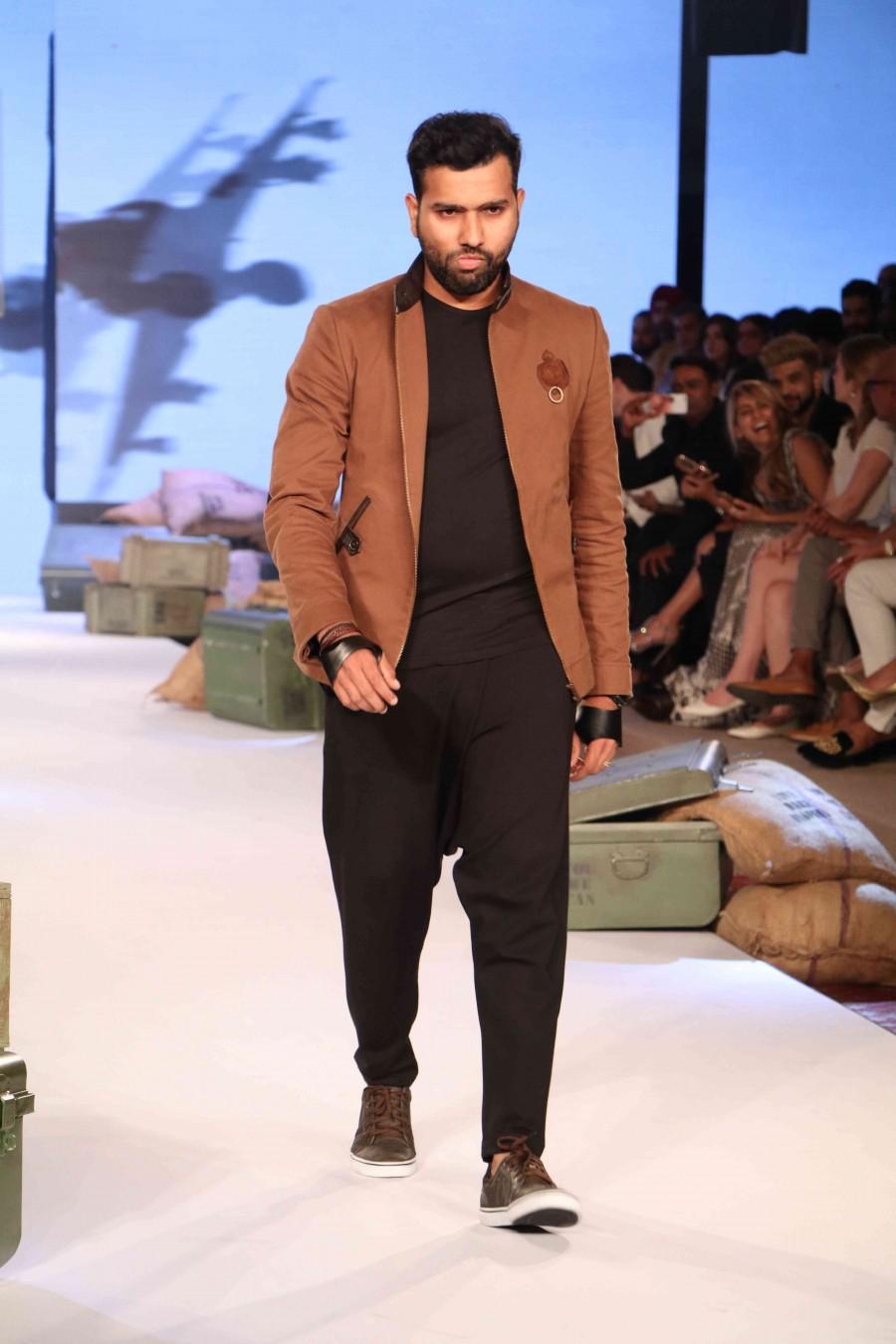 Cricketer Yuvraj Singh has forayed into the fashion industry by launching his brand YWC Fashion in collaboration with designers Shantanu and Nikhil. Celebs like Virender Sehwag, Chris Gayle, Zaheer Khan, Ishant Sharma and others graced the event. Yuvraj Singh,Yuvraj Singh's clothline launch,Virender Sehwag,Chris Gayle,Zaheer Khan,Ishant Sharma,Yuvraj Singh clothline launch,Yuvraj Singh clothline launch pics,Yuvraj Singh clothline launch images,Yuvraj Singh clothline launch photos,Yuvraj Singh