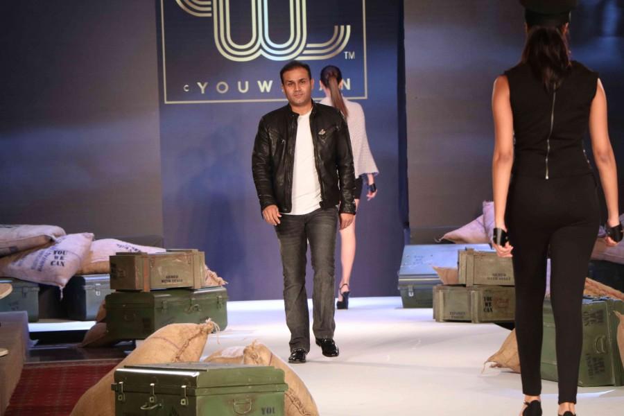 Cricketer Yuvraj Singh has forayed into the fashion industry by launching his brand YWC Fashion in collaboration with designers Shantanu and Nikhil. Celebs like Virender Sehwag, Chris Gayle, Zaheer Khan, Ishant Sharma and others graced the event. Yuvraj Singh,Yuvraj Singh's clothline launch,Virender Sehwag,Chris Gayle,Zaheer Khan,Ishant Sharma,Yuvraj Singh clothline launch,Yuvraj Singh clothline launch pics,Yuvraj Singh clothline launch images,Yuvraj Singh clothline launch photos,Yuvraj Singh