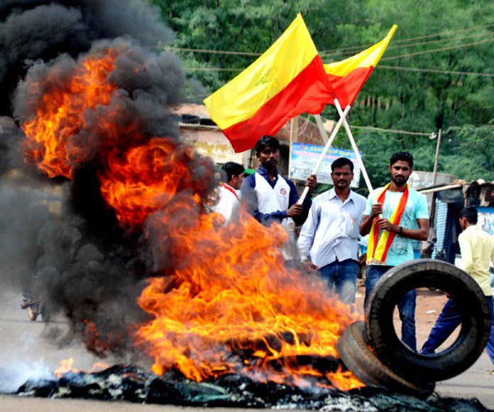 Hundreds of people, especially farmers on Monday staged protest demonstrations in the Mysuru region against the Supreme Court order to Karnataka for releasing 15,000 cusecs of water daily for 10 days to Tamil Nadu. Cauvery Water Issue,Cauvery Water,Protests in Karnataka,Karnataka,Karnataka Bandh,Tamil Nadu,Cauvery Water problem,Supreme Court,J. Jayalalithaa