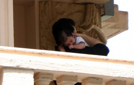 Bollywood actor Tusshar Kapoor takes a stroll with his teeny, tiny son Laksshya.