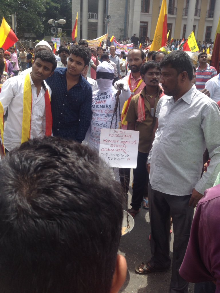 Karnataka is protesting the state government's release of Cauvery river water to Tamil Nadu, based on a Supreme Court directive, with a shut down on Friday. Cauvery water row,Cauvery water,Karnataka Bandh shuts down Bengaluru,Karnataka Bandh,Bengaluru,Tamil Nadu,Karnataka Bandh pics,Karnataka Bandh images,Karnataka Bandh photos,Karnataka Bandh stills,Karnataka Bandh pictures