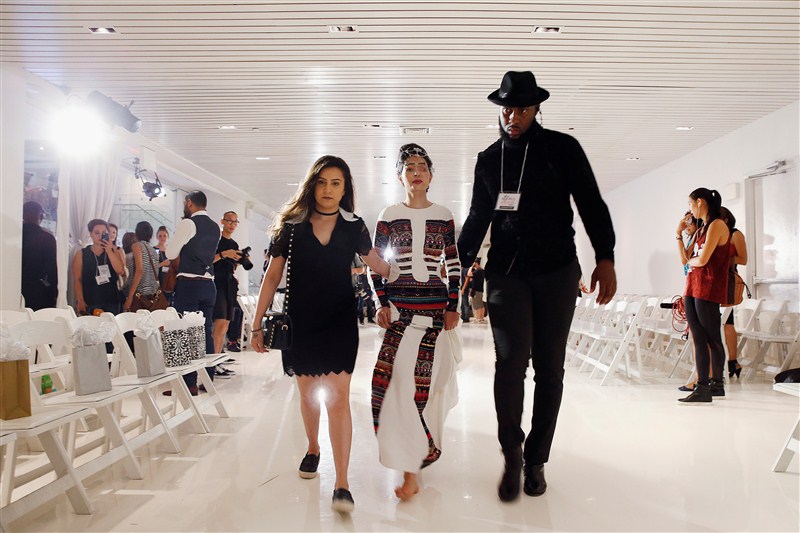 An Indian model scarred in an acid attack challenged perceptions of beauty as she strutted down the runway at New York Fashion Week to promote a ban on the sale of corrosive substances used to maim thousands of women and children each year. New York Fashion Week,NYFW,New York Fashion Week 2016,Reshma Qureshi,Reshma Qureshi walks ramp,Acid-Attack Survivor Reshma Qureshi,Reshma Qureshi pics,Reshma Qureshi images,Reshma Qureshi New York Fashion Week,Reshma Qureshiphotos,Reshma Qureshi pictures
