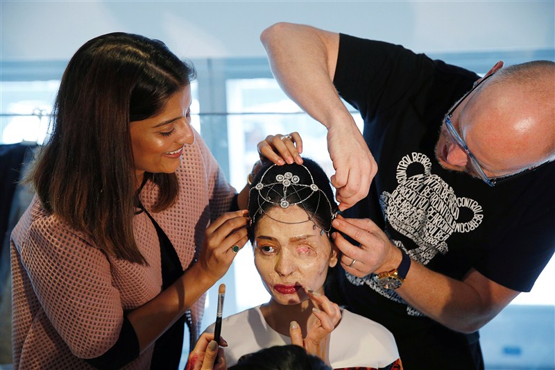 An Indian model scarred in an acid attack challenged perceptions of beauty as she strutted down the runway at New York Fashion Week to promote a ban on the sale of corrosive substances used to maim thousands of women and children each year. New York Fashion Week,NYFW,New York Fashion Week 2016,Reshma Qureshi,Reshma Qureshi walks ramp,Acid-Attack Survivor Reshma Qureshi,Reshma Qureshi pics,Reshma Qureshi images,Reshma Qureshi New York Fashion Week,Reshma Qureshiphotos,Reshma Qureshi pictures