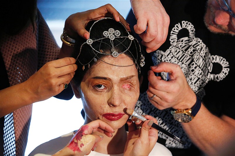 An Indian model scarred in an acid attack challenged perceptions of beauty as she strutted down the runway at New York Fashion Week to promote a ban on the sale of corrosive substances used to maim thousands of women and children each year. New York Fashion Week,NYFW,New York Fashion Week 2016,Reshma Qureshi,Reshma Qureshi walks ramp,Acid-Attack Survivor Reshma Qureshi,Reshma Qureshi pics,Reshma Qureshi images,Reshma Qureshi New York Fashion Week,Reshma Qureshiphotos,Reshma Qureshi pictures