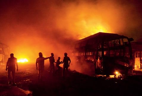 Widespread violence broke out in southern Karnataka on Monday over the apex court order to release Cauvery river water to Tamil Nadu, with angry Kannadiga protesters torching over 30 buses of a Tamil-owned bus depot in Bengaluru. Cauvery water row,Cauvery water,Cauvery water dispute,144 imposed in Bangalore,144 in Bangalore,Bangalore after violence,Kannadiga protesters,Tamil Nadu,Karnataka and Tamil Nadu