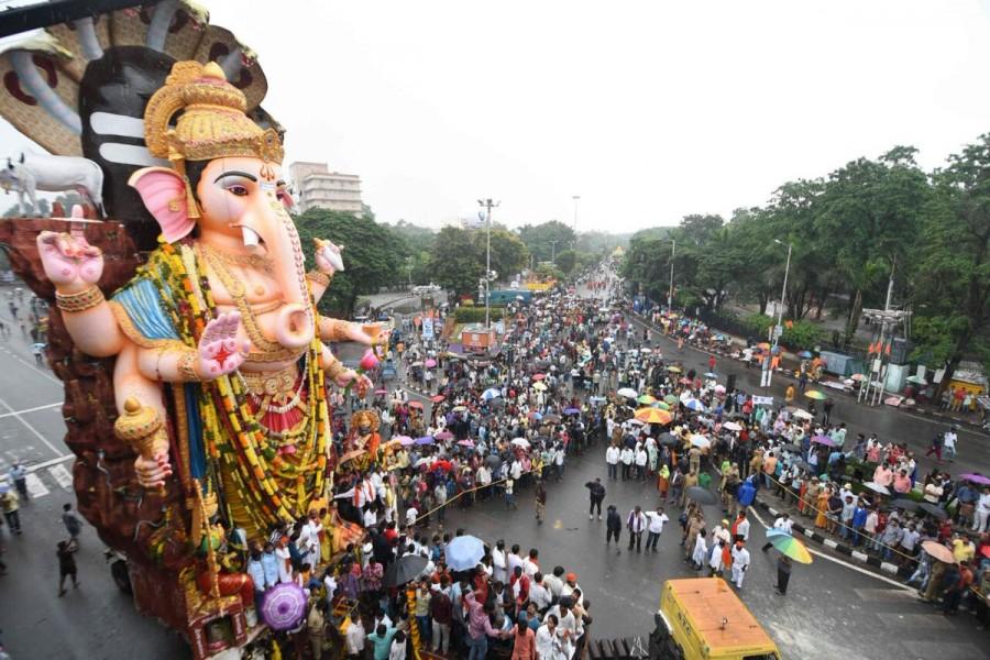 The immersion of Ganesh idols was underway in Hyderabad on Thursday with religious fervour and amid rain and tight security. Maha Ganapathi,Maha Ganapathi immersion,Maha Ganapathi immersion in Hyderabad,Ganapathi immersion in Hyderabad,Ganesh Visarjan,Ganesh Visarjan in Hyderabad,Ganesh Visarjan pics,Ganesh Visarjan images,Ganesh Visarjan photos,Ganesh Visarjan pictures